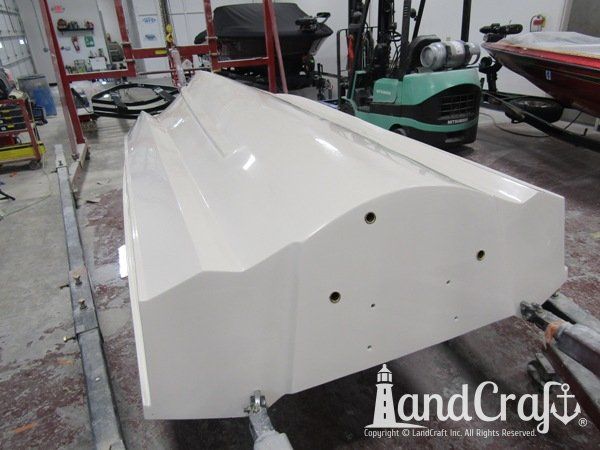Boston Whaler with gelcoat refinishing completed on the bottom hull