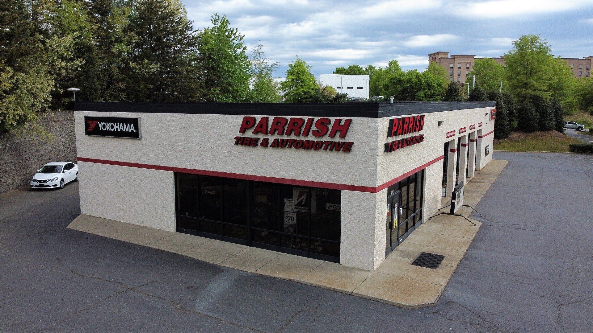 An aerial view of a parrish tire and automotive shop.
