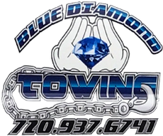 Logo for Takeoff Towing & Transport, features a plane silhouette, and stylized red road-like image.