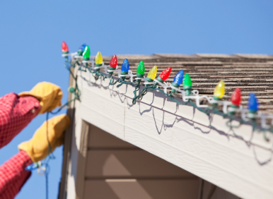 Christmas light installation on Irvine CA house