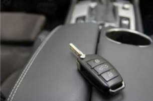 Picture of Key Stuck in Car with people outside