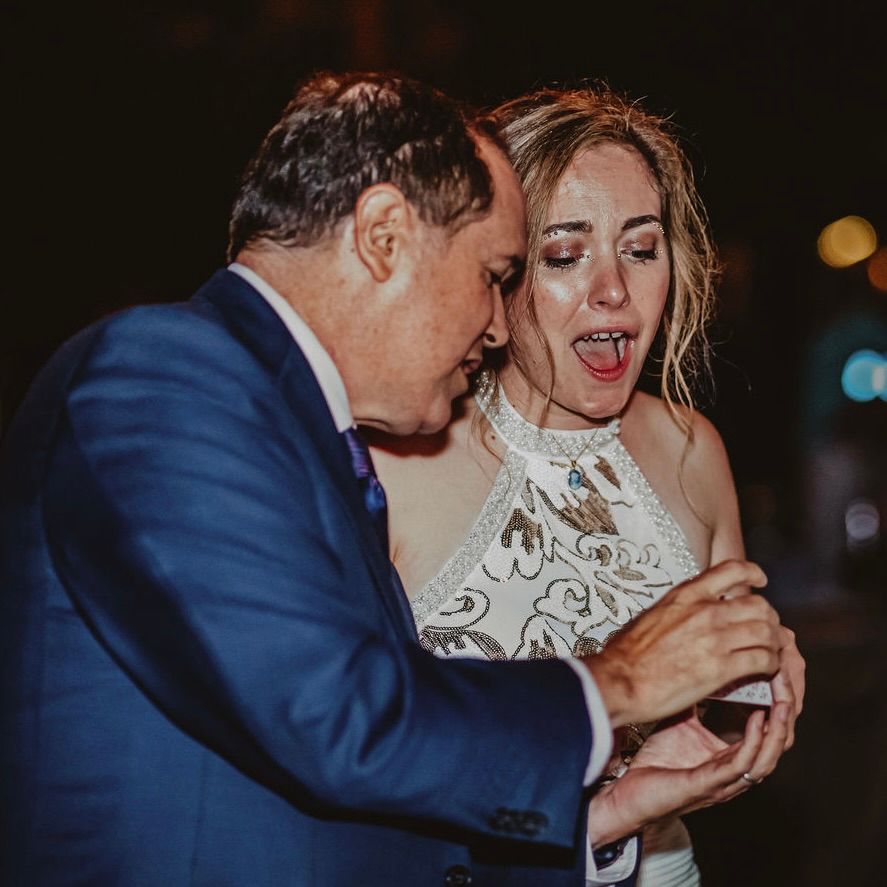 Bay Area magician David Martinez wows a bride with magic at a wedding