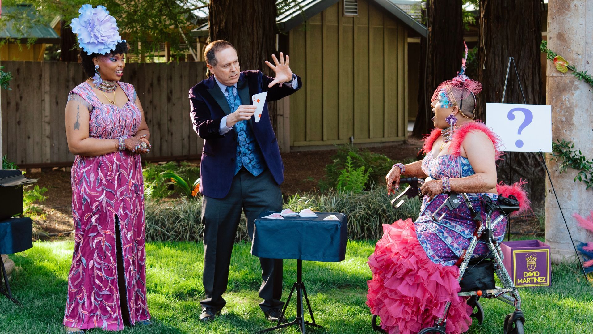 Wedding magician David Martinez performs for a wedding couple at their big event.