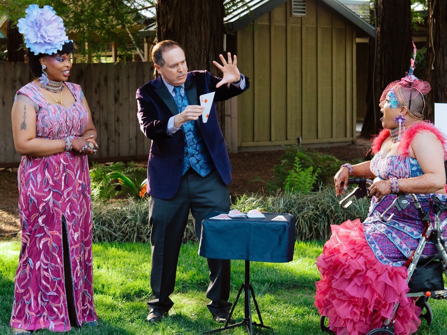 Wedding magician David Martinez performs a magic trick for a couple at their wedding.