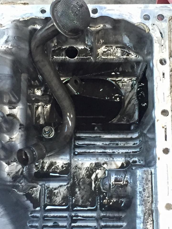 A Close Up of a Car Engine With a Hose Coming Out of It — Shoalhaven Diesel Tech in South Nowra, NSW