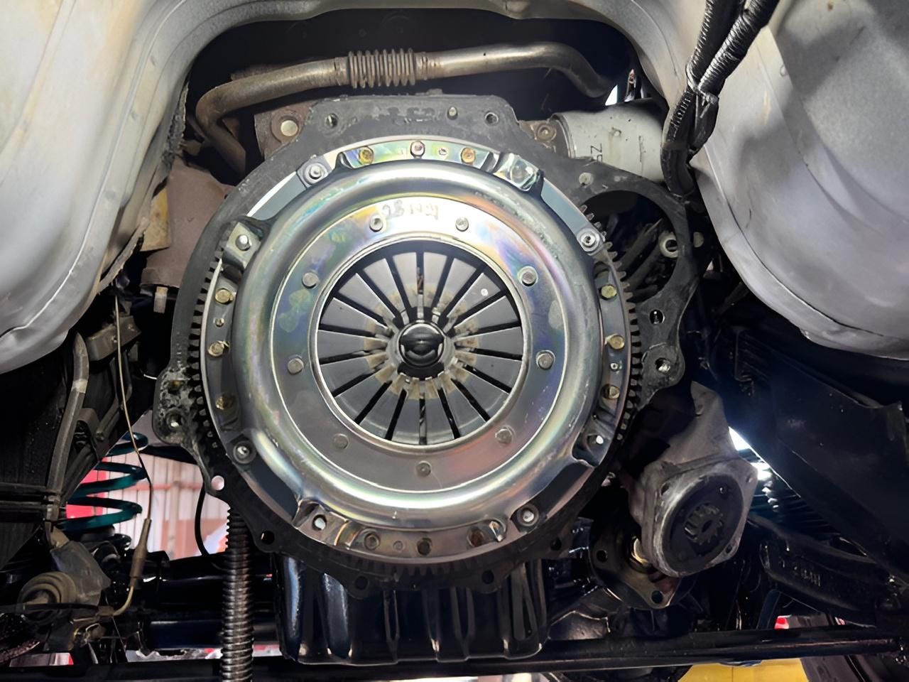 Clutch plate and pressure plate assembly undergoing replacement at a Nowra mechanic workshop
