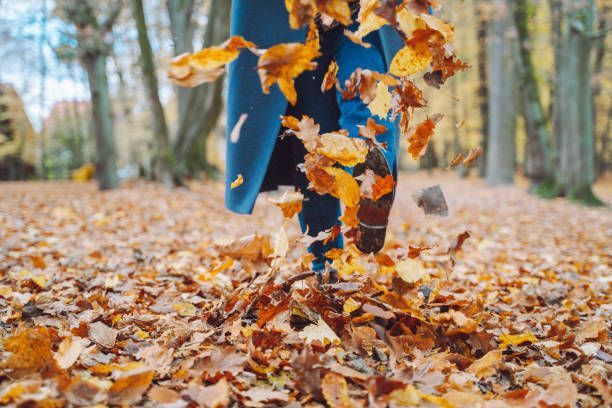 Woman with tree leaves