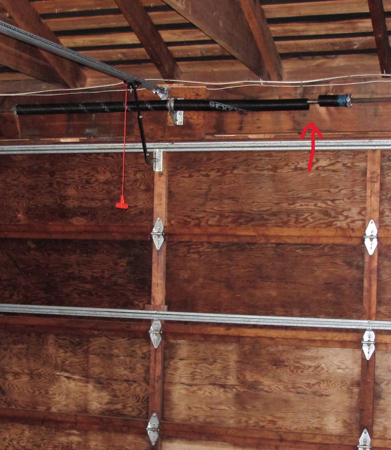 Broken garage door spring requiring professional repair by Garage Tech serving Kenmore Washington
