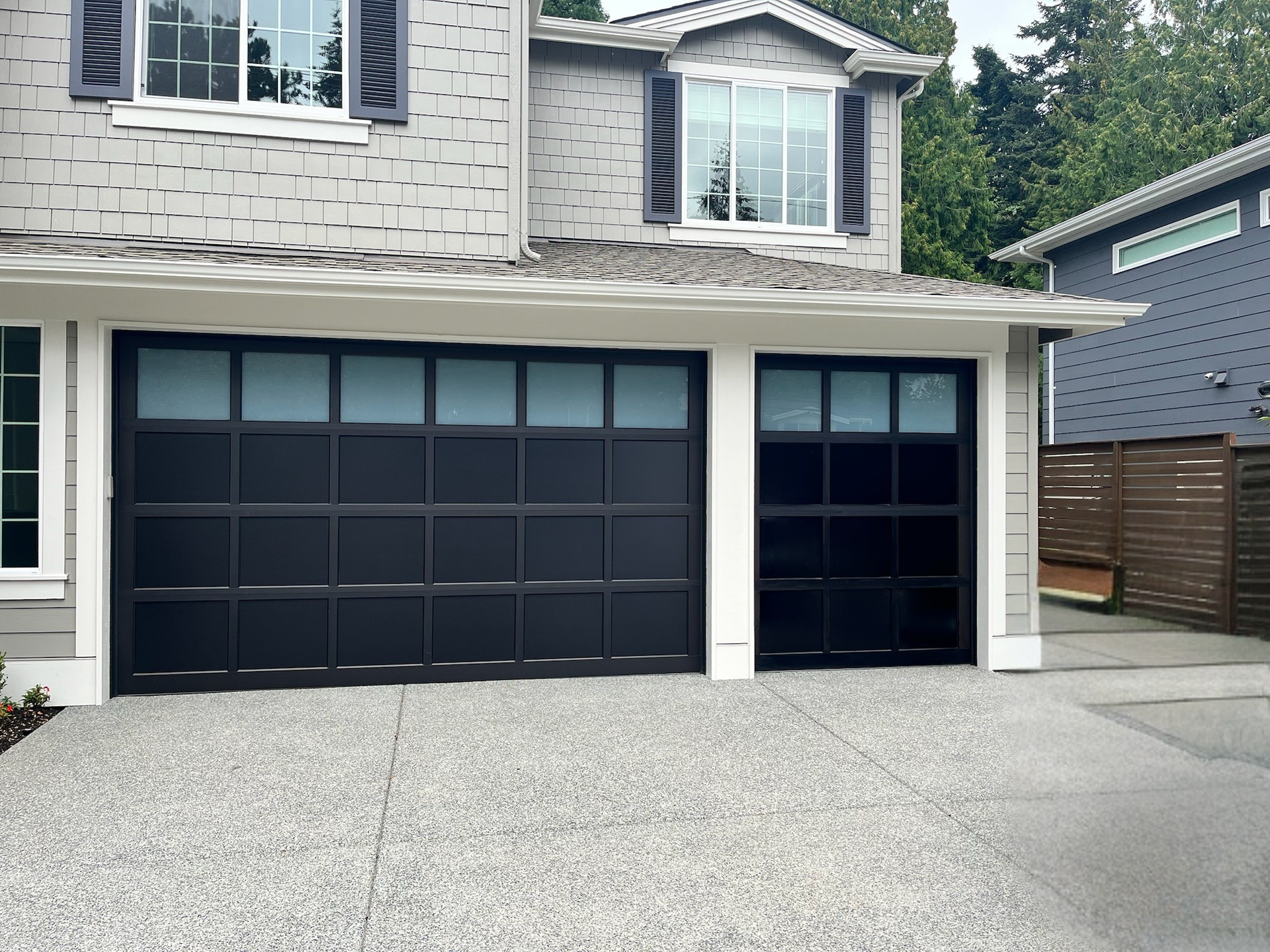 Modern garage doors designed for residential homes by Garage Tech serving Shoreline, WA