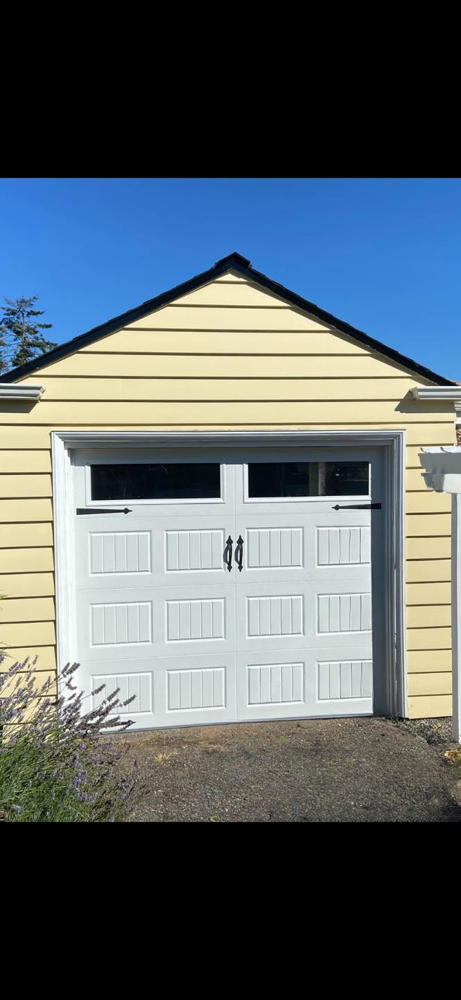 Handcrafted style wood carriage garage doors by Garage Tech serving Lynnwood, WA