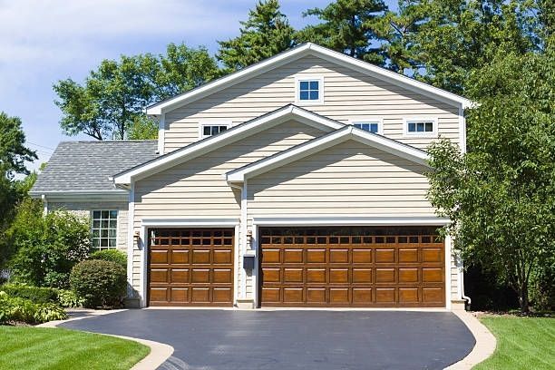 Traditional steel garage doors with raised panels by Garage Tech serving Kirkland, WA