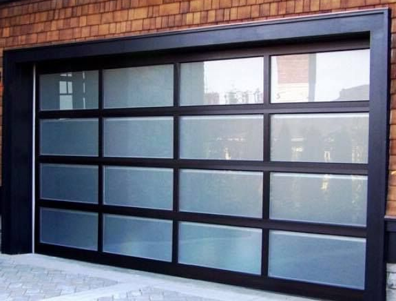 Contemporary garage door design with glass elements by Garage Tech serving Kirkland, WA