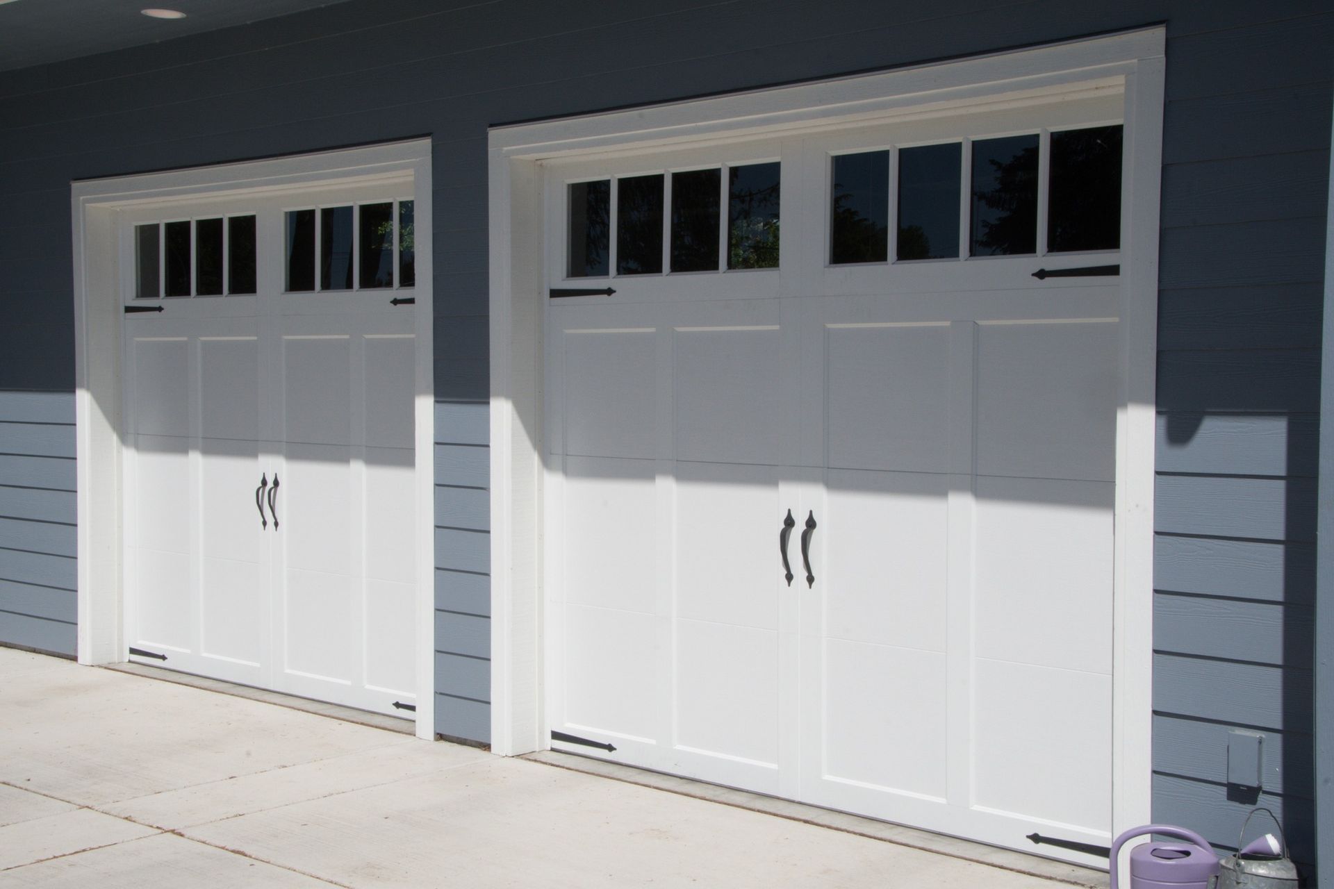 Custom wood carriage garage door showcasing natural materials installed by Garage Tech in the Bothell, WA area