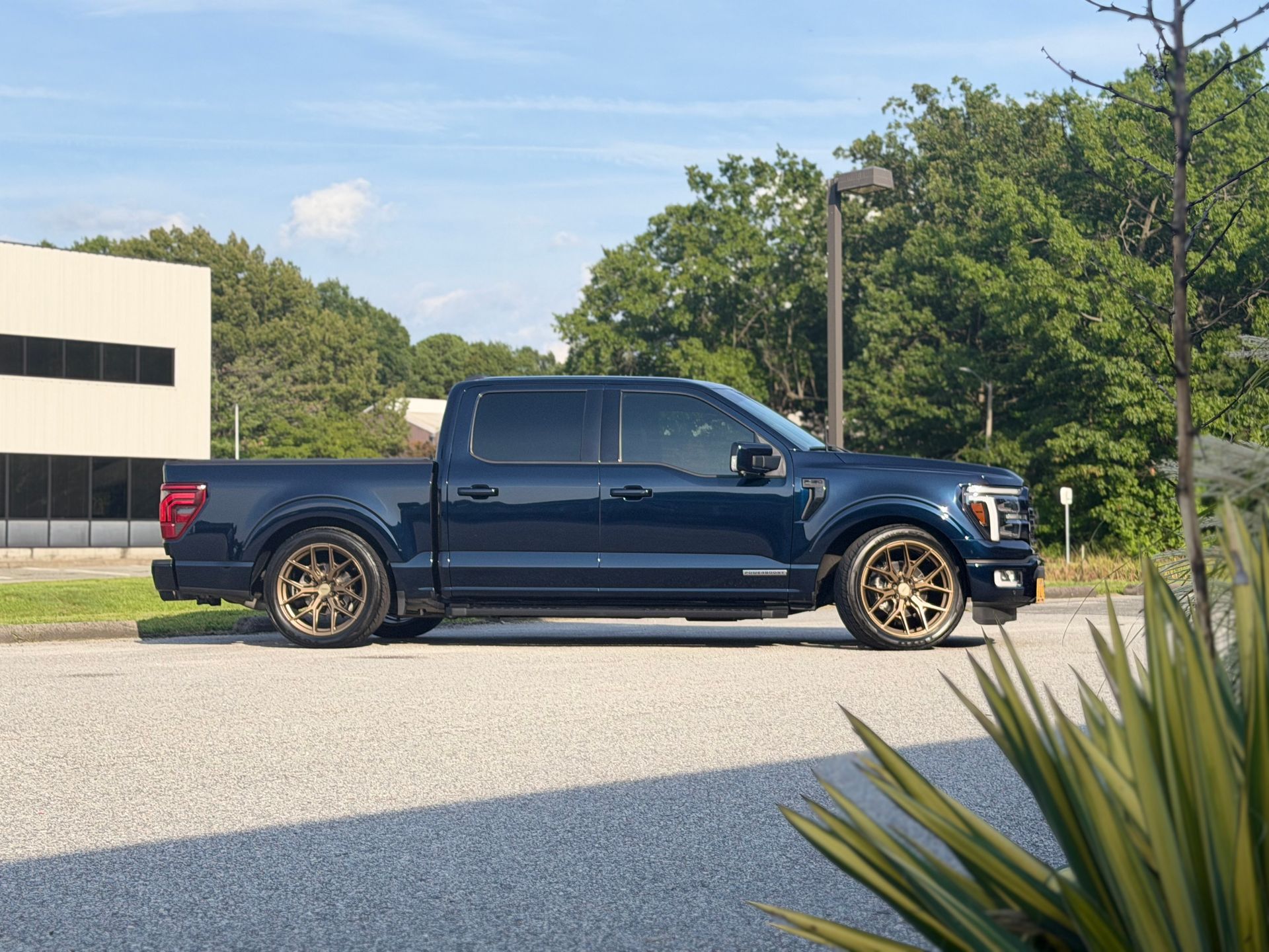 F150_Ford_Lariat_Antimatter_blue_PPF_Ceramic_Coating_Ceramic_Tint_rear_side_view.jpeg