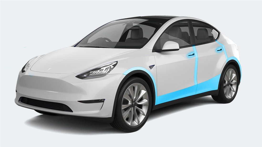 A white tesla model y with blue lines on the side.