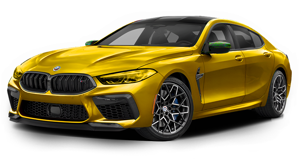 Yellow BMW M8 Gran Coupe, black grille, dark wheels.
