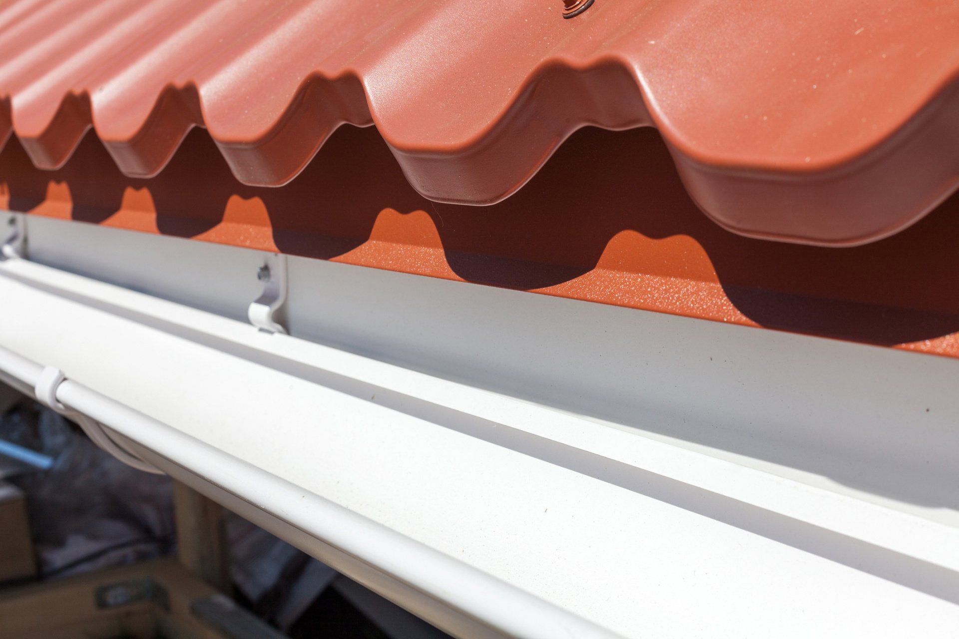 Metal Tile With White Rain Gutter — Independence, VA — Primos Multi-Service