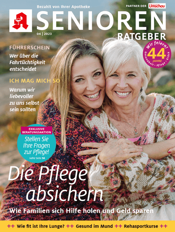 Auf dem Cover einer Zeitschrift umarmen sich zwei Frauen.