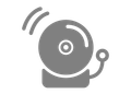A gray icon of a bell on a white background.