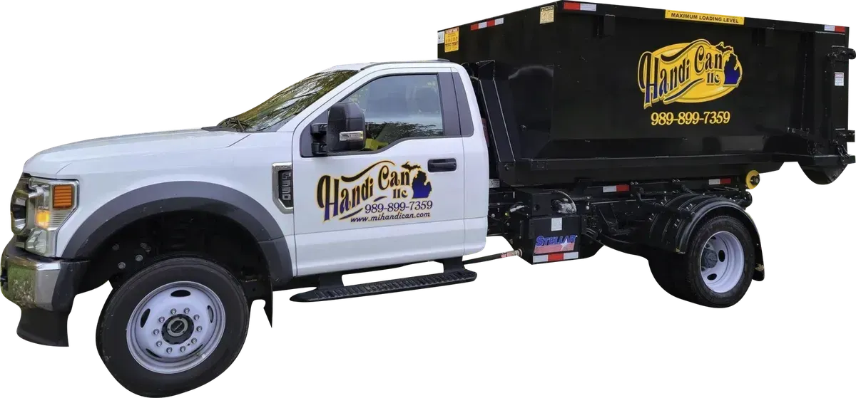 Handi Can Dumpster Rental roll-off truck delivering a dumpster in Midland, MI
