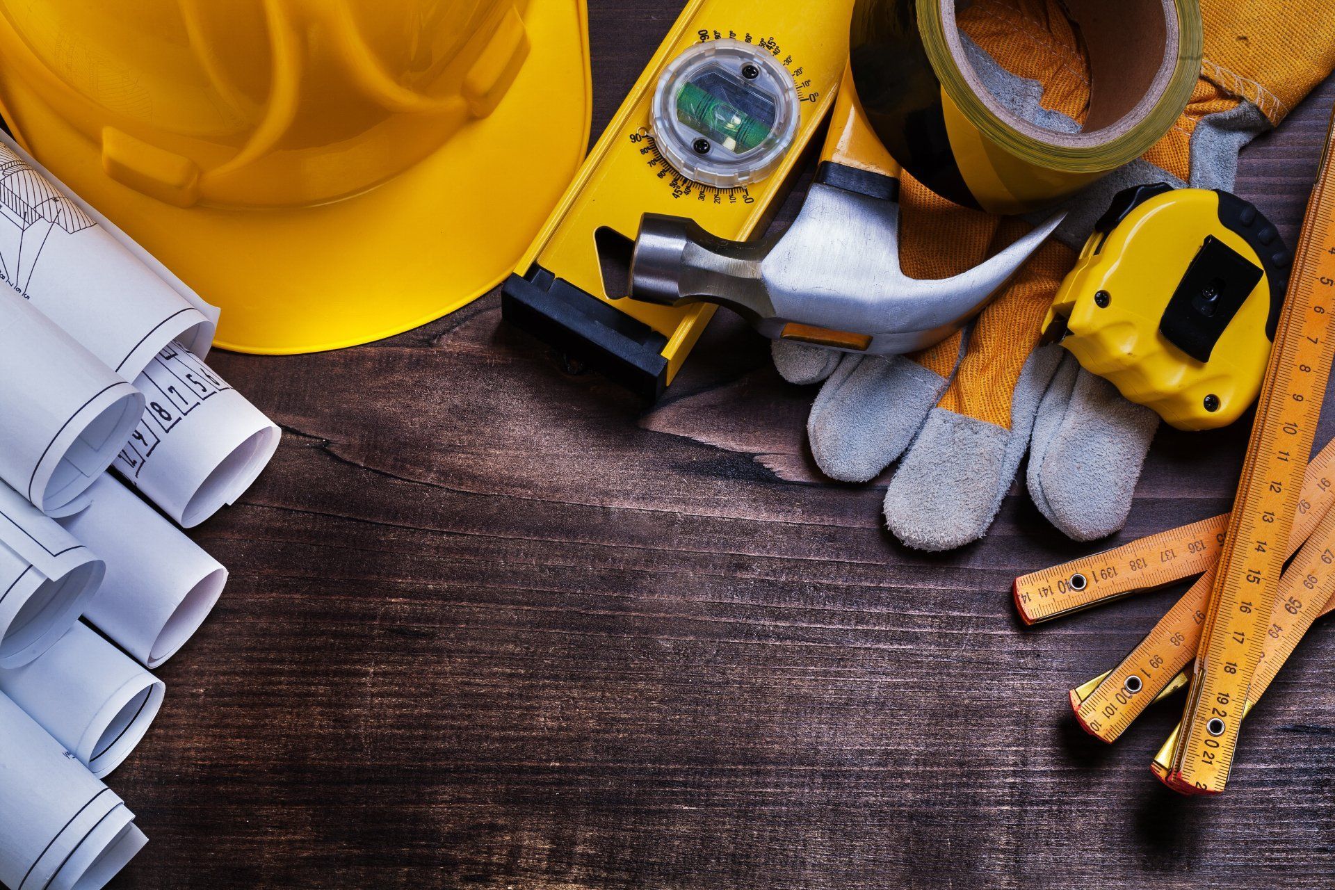 Construction Tools And Blueprints On Wood Surface — Wendy's Safety Services in Moulden, NT