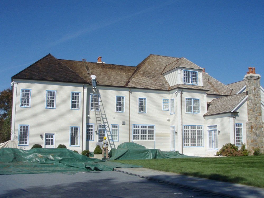 Man Painting the Room — Fairfield, CT — Stephen Gidley Inc.