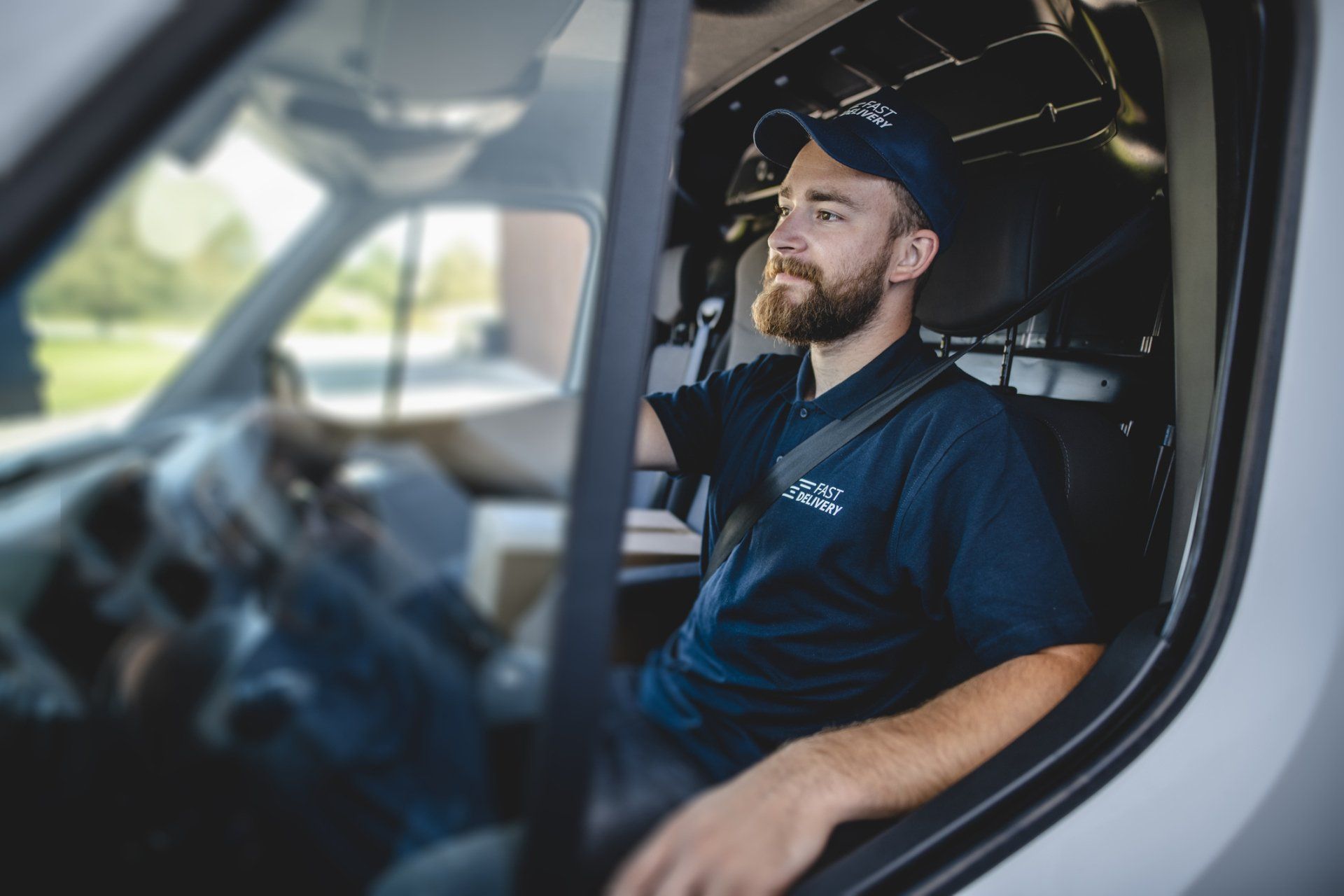 happy man driving servicing van