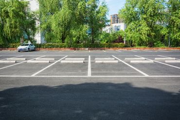 Austin and Sons Parking Lot Protection. One Application. 10-Year Warranty