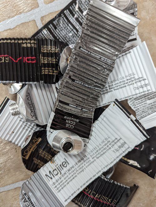 A pile of tubes of majirel hair color