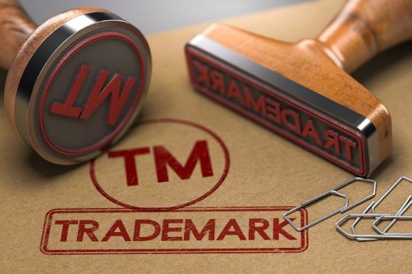 Two wooden stampers with