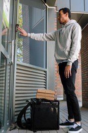 a man delivering pizza