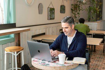 a restaurant owner reviewing online presence