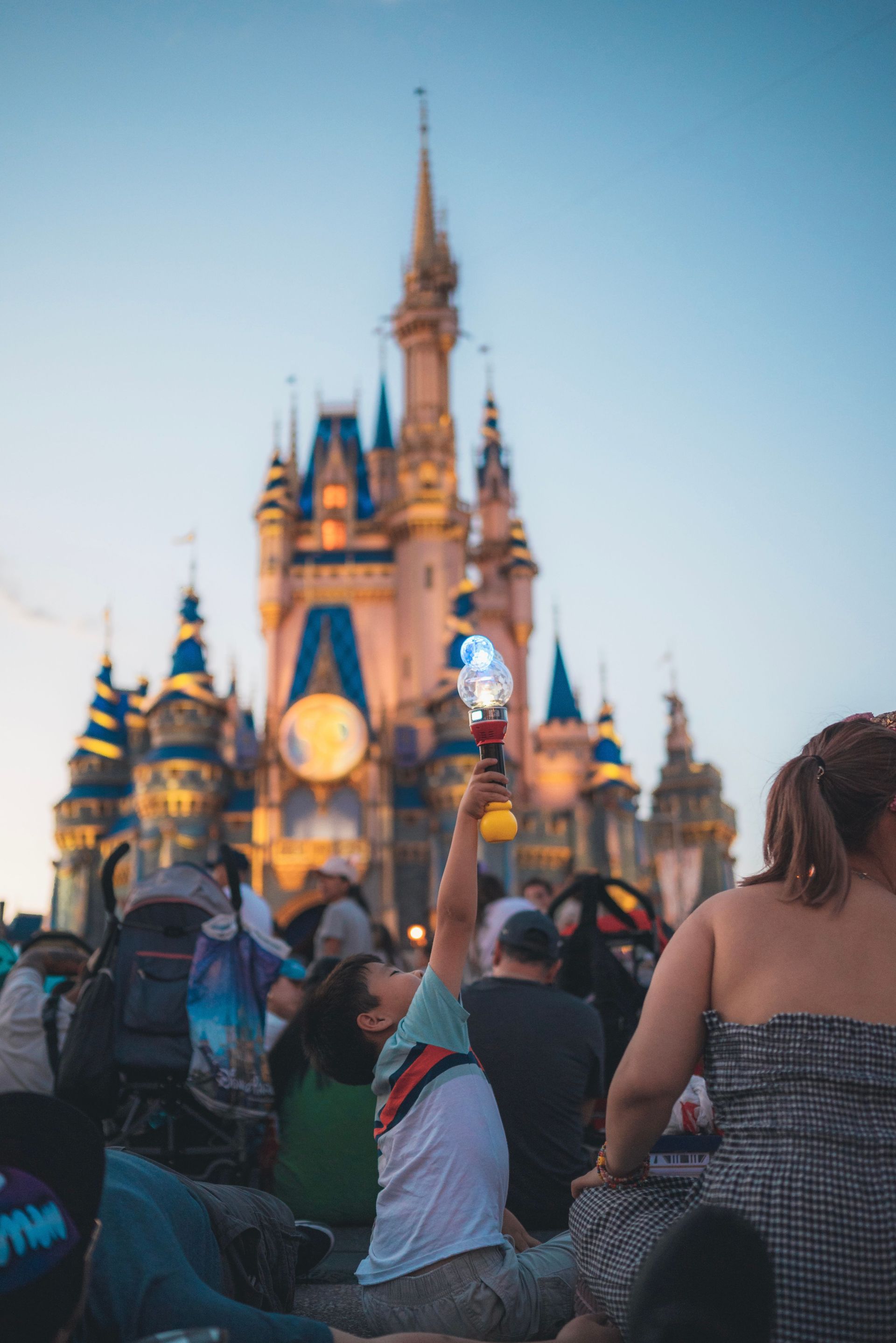 Family at Disney theme park entrance