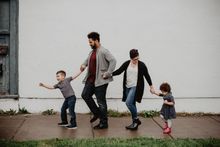 Parents cheering at youth sports game