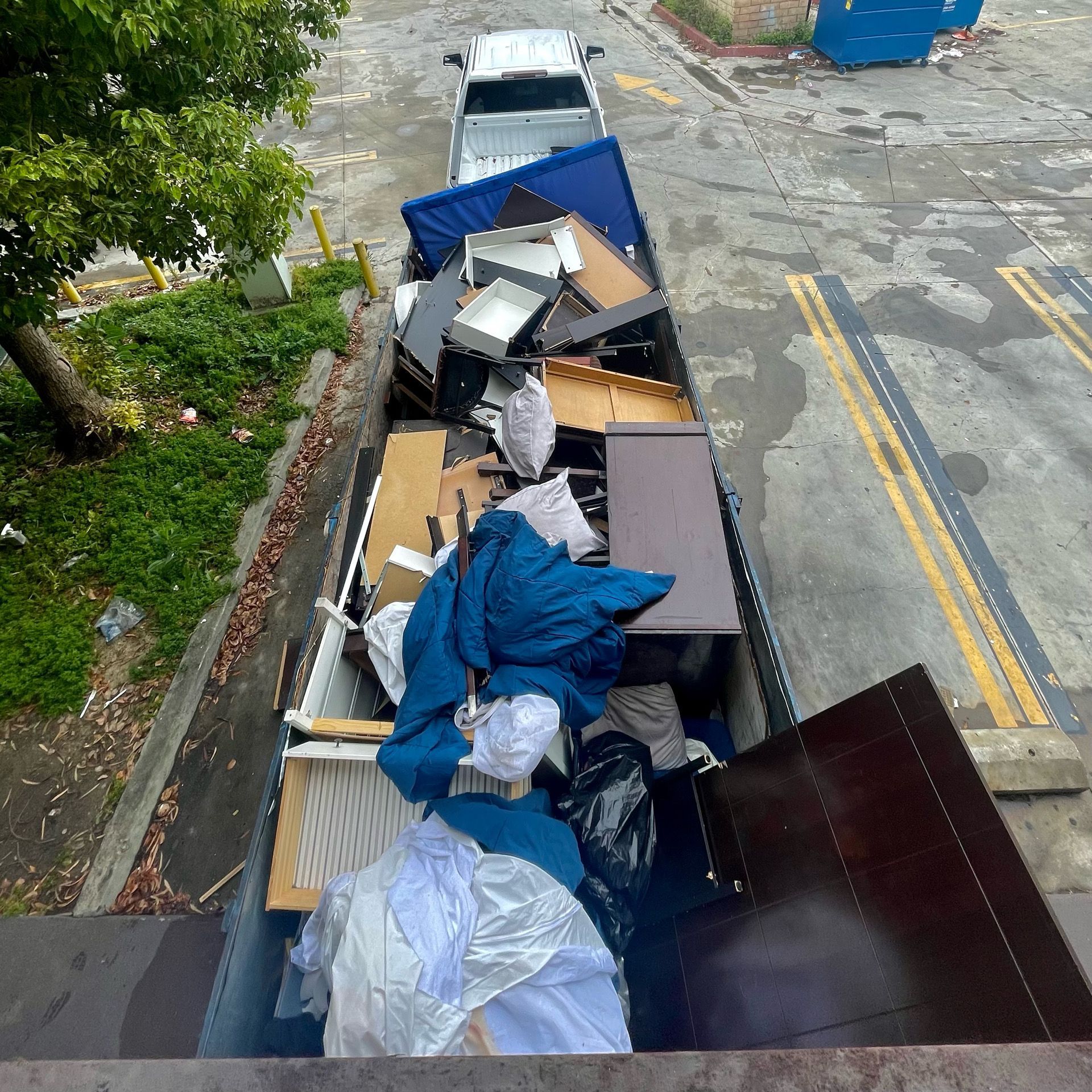 Junk Guys LA handling large-scale commercial junk removal, including office furniture and equipment.