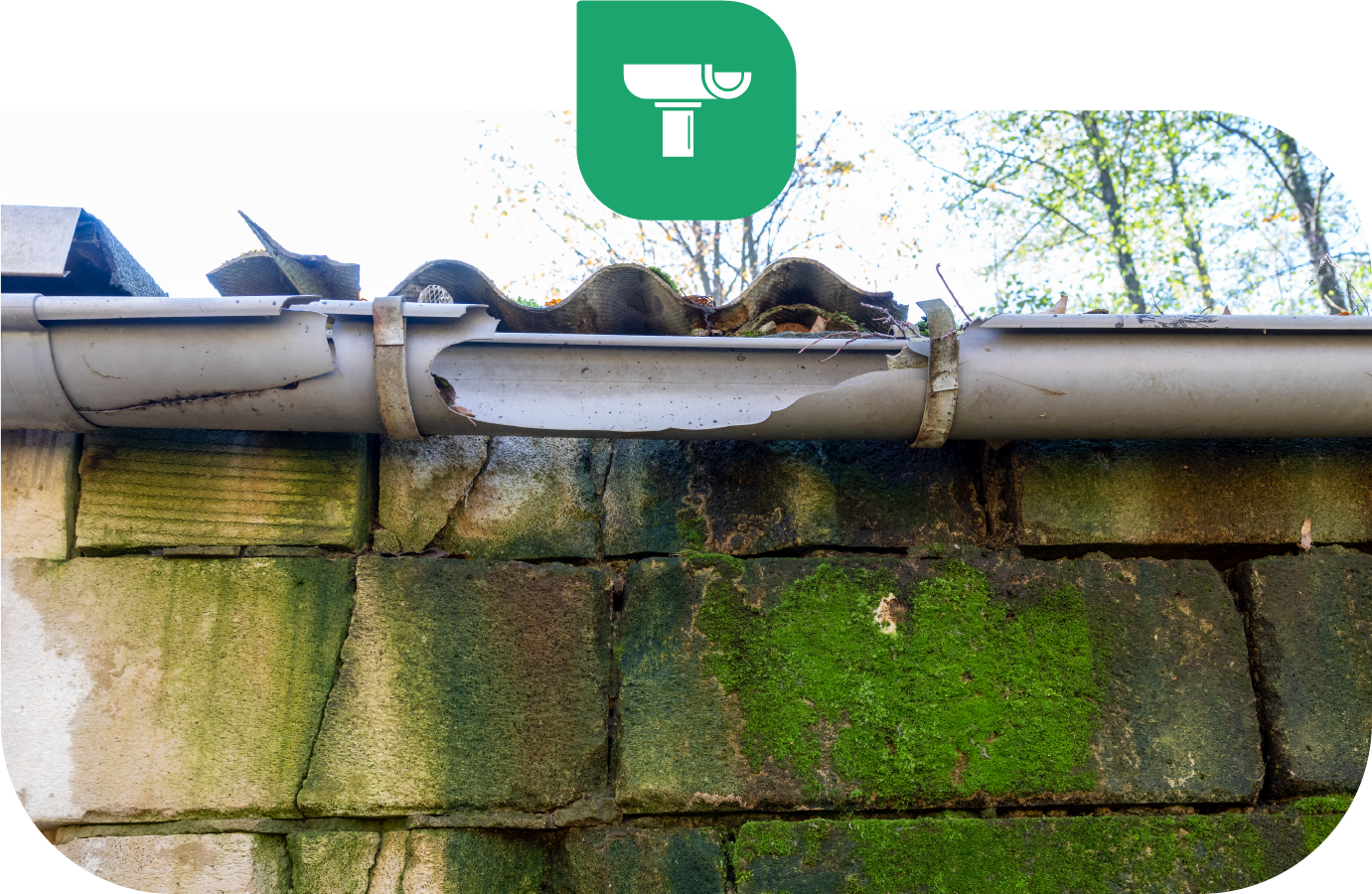 Damaged gutter on moss-covered brick wall. Green icon depicts gutter cleaning.