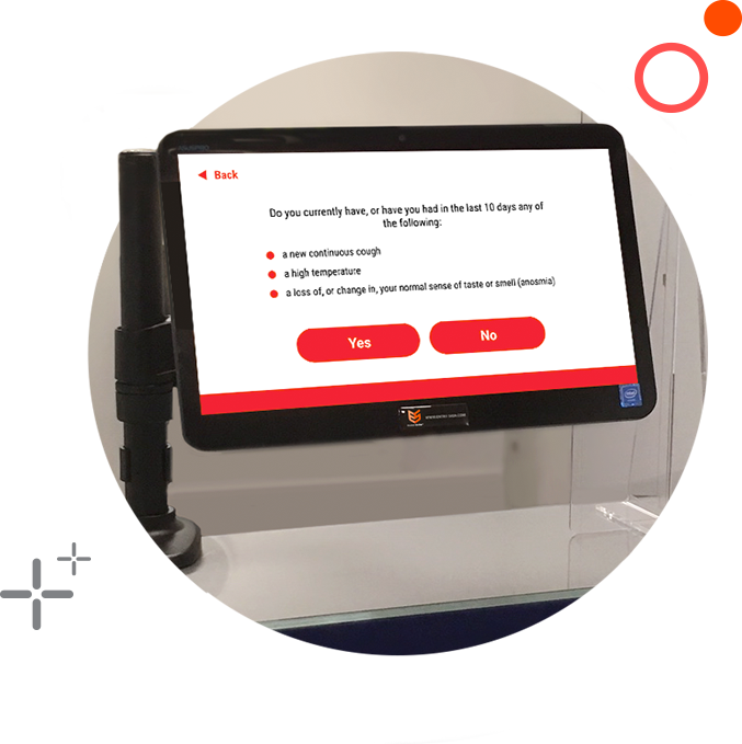Tablet screen with a questionnaire asking about COVID-19 symptoms; red 