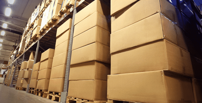 Packaging Company in Greene County, VA: A warehouse filled with lots of cardboard boxes on shelves.