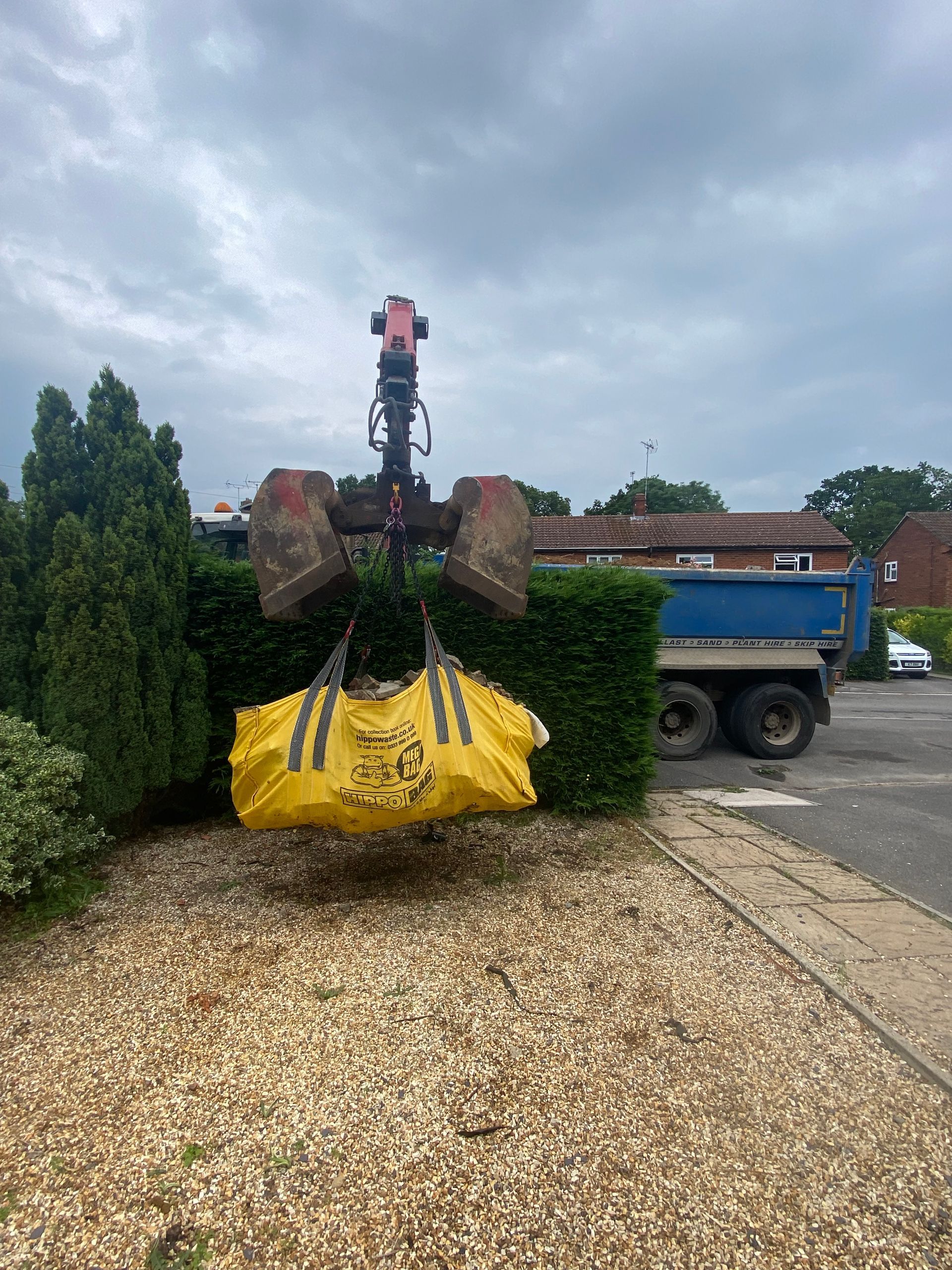 Large 4 yard bulk bag collected in Wokingham using mechanical lifting equipment