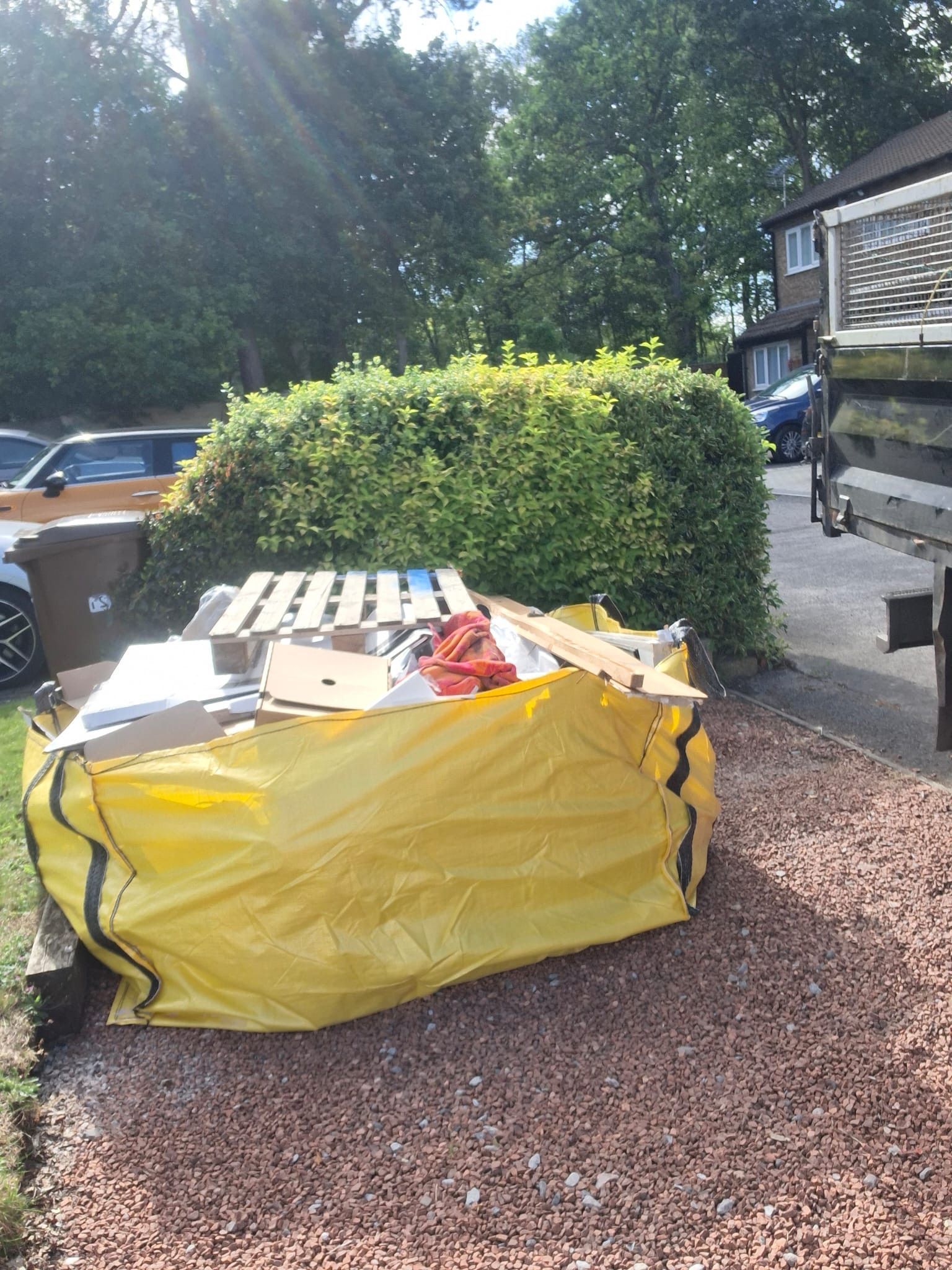 Filled skip bag removal from residential property in Sandhurst