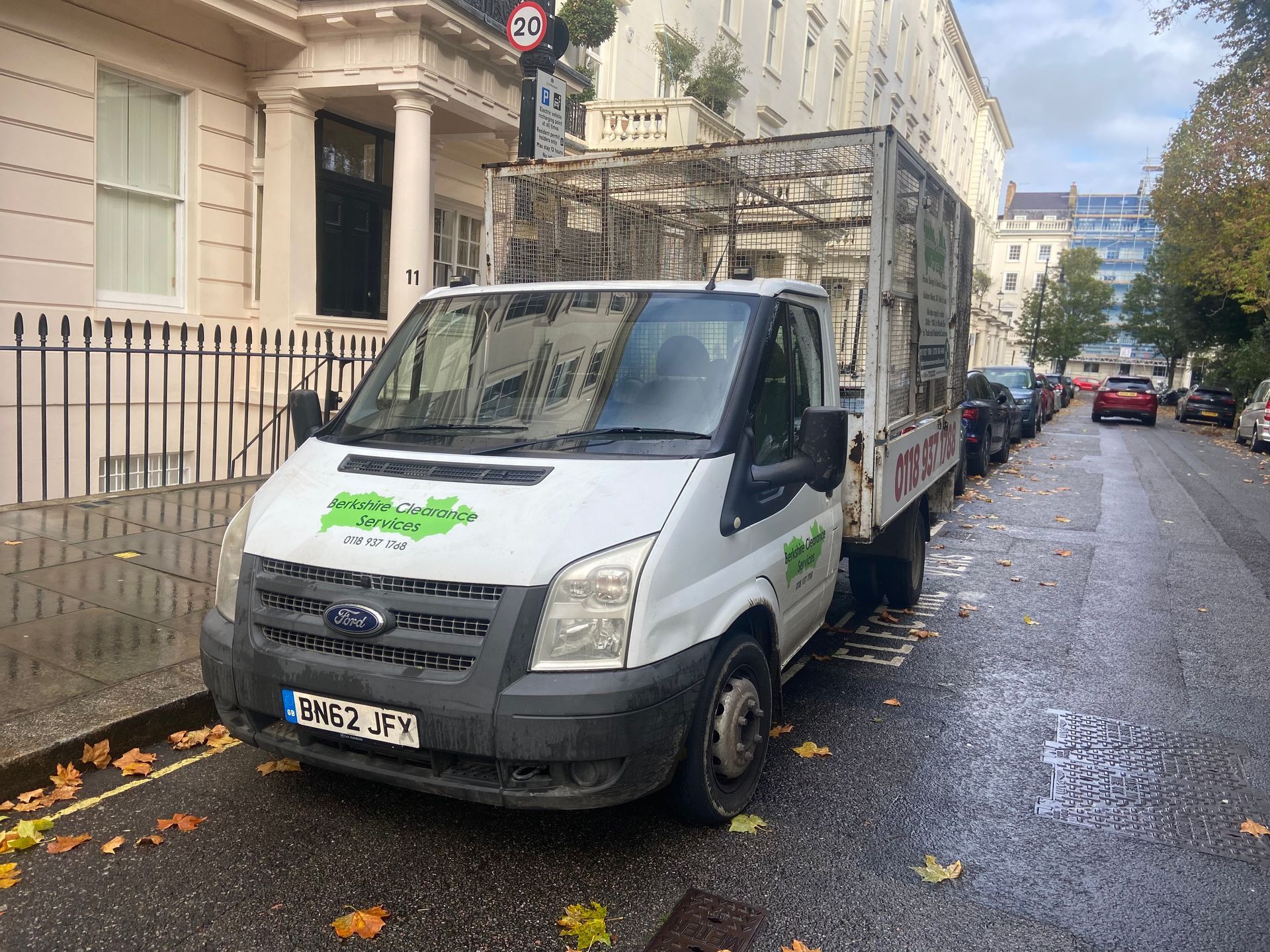Berkshire Clearance Services waste collection vehicle working at night in Pimlico London