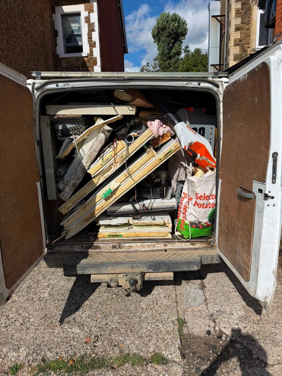 Van loaded with dismantled cold room panels for waste removal in Petersfield
