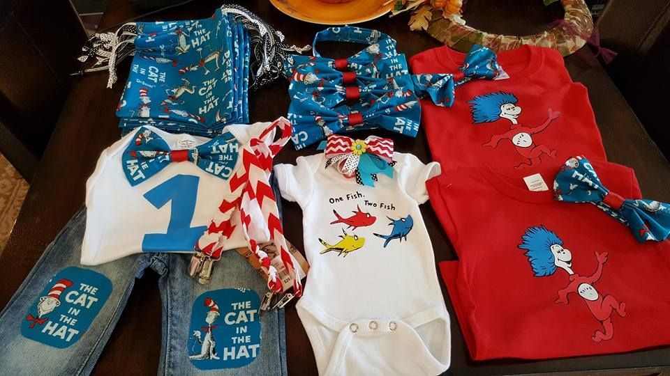 Dr. Seuss-themed baby clothes set, including shirts, onesies, patterned bow ties, red suspenders, and embellished jeans.