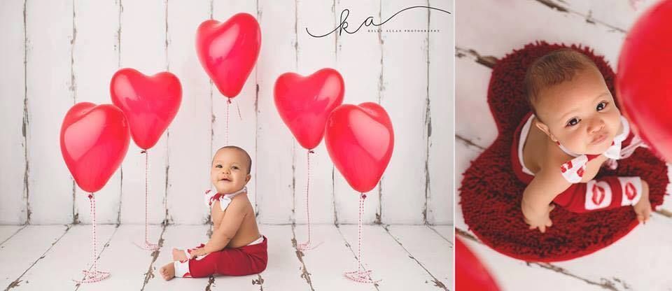 A child sitting on a white floor surrounded by red heart-shaped balloons, and a close-up on a red heart-shaped rug.