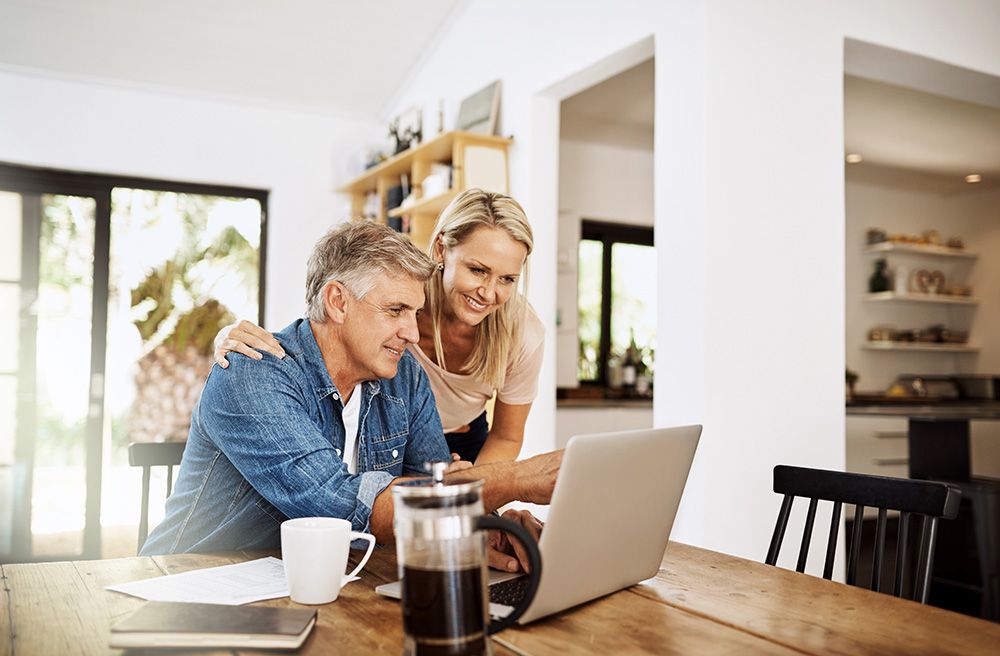 Middle aged couple planning their funeral or cremation arrangements