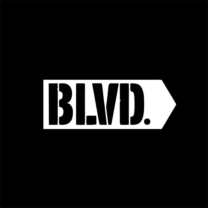 BLVD. text in white stencil font with an arrow on the right against a black background.