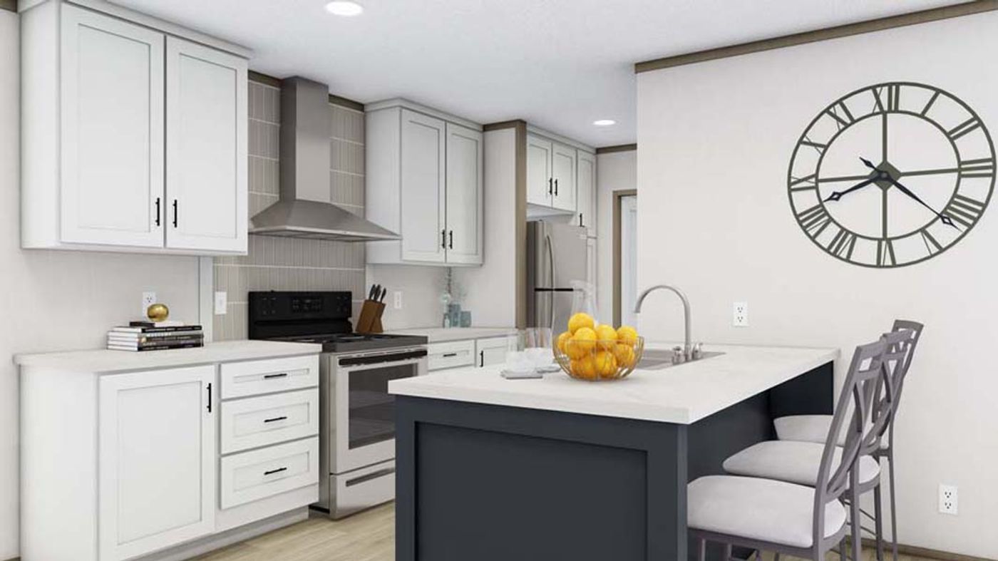 A kitchen with white cabinets and a large clock on the wall.