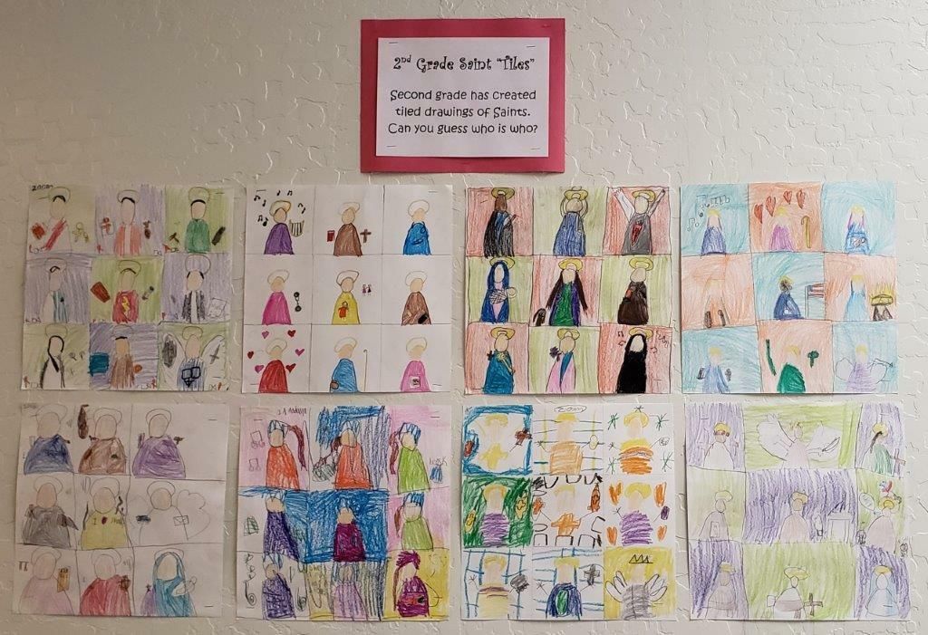 Wall covered with colorful children’s drawings and a small sign above the display.