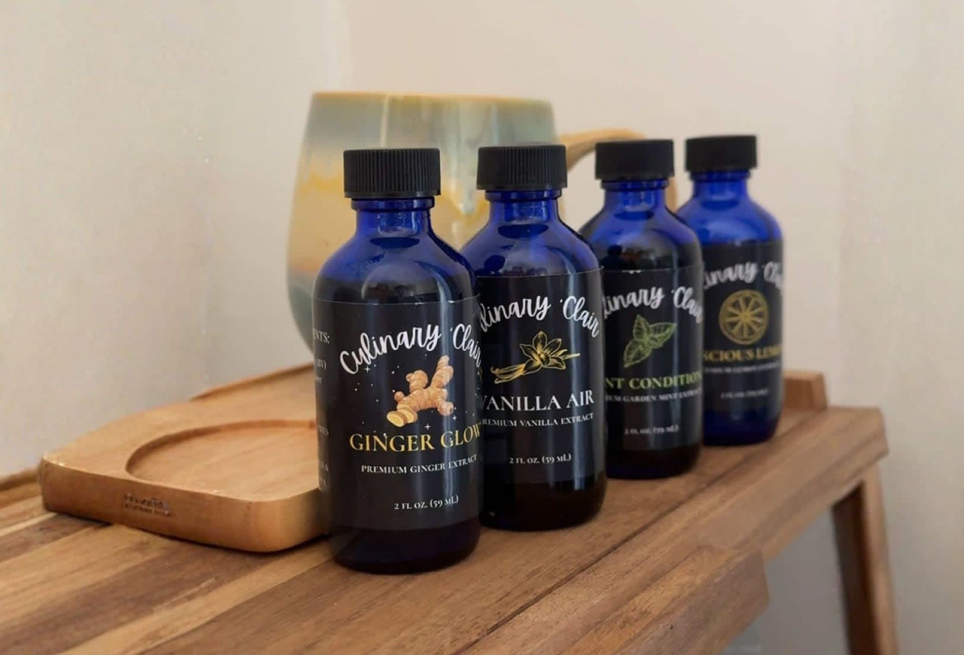 Four blue-bottled extracts labeled.