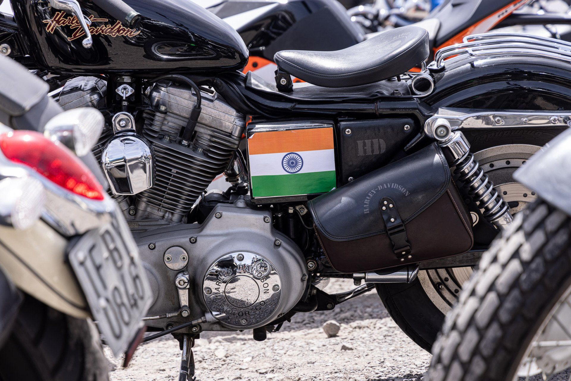 A harley davidson motorcycle with an indian flag on the side